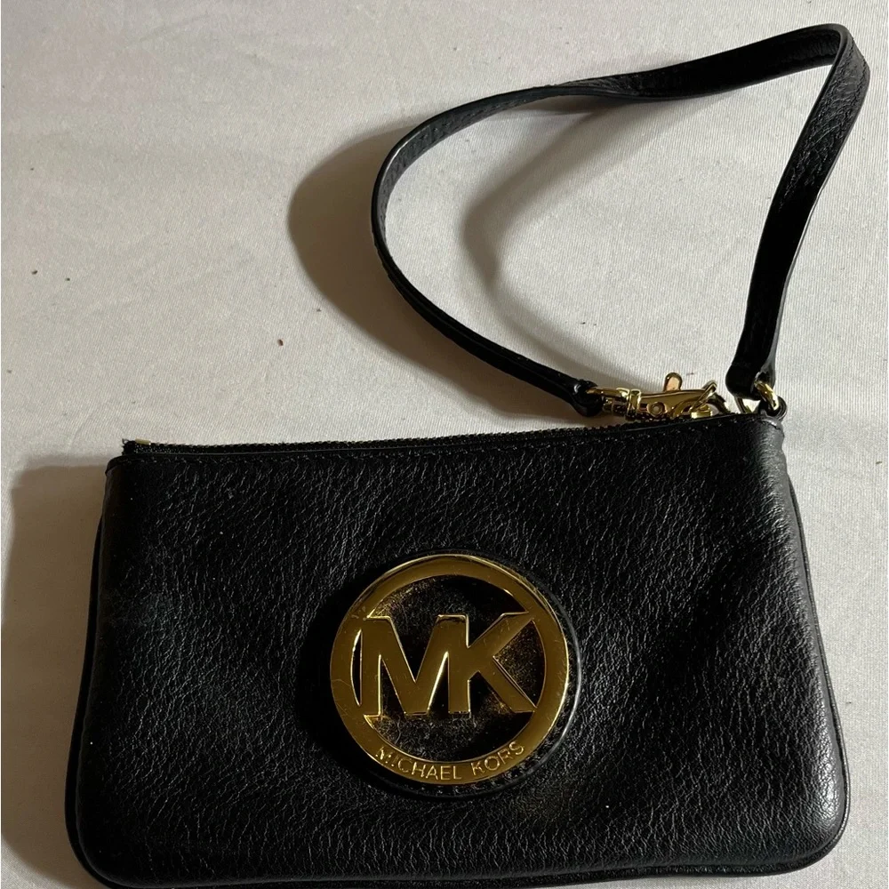 Michael Kors, black leather, wristlet, gold detail 2 inside pockets like new
